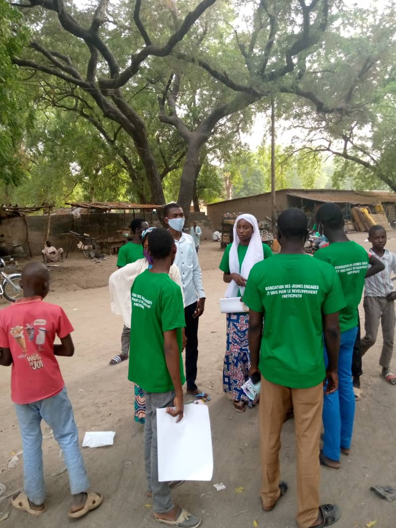 Campagne de sensibilisation et de distribution des masques faciaux pour la prévention de covid 19 - Photo 3